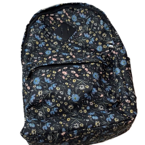 black backpack with flowers